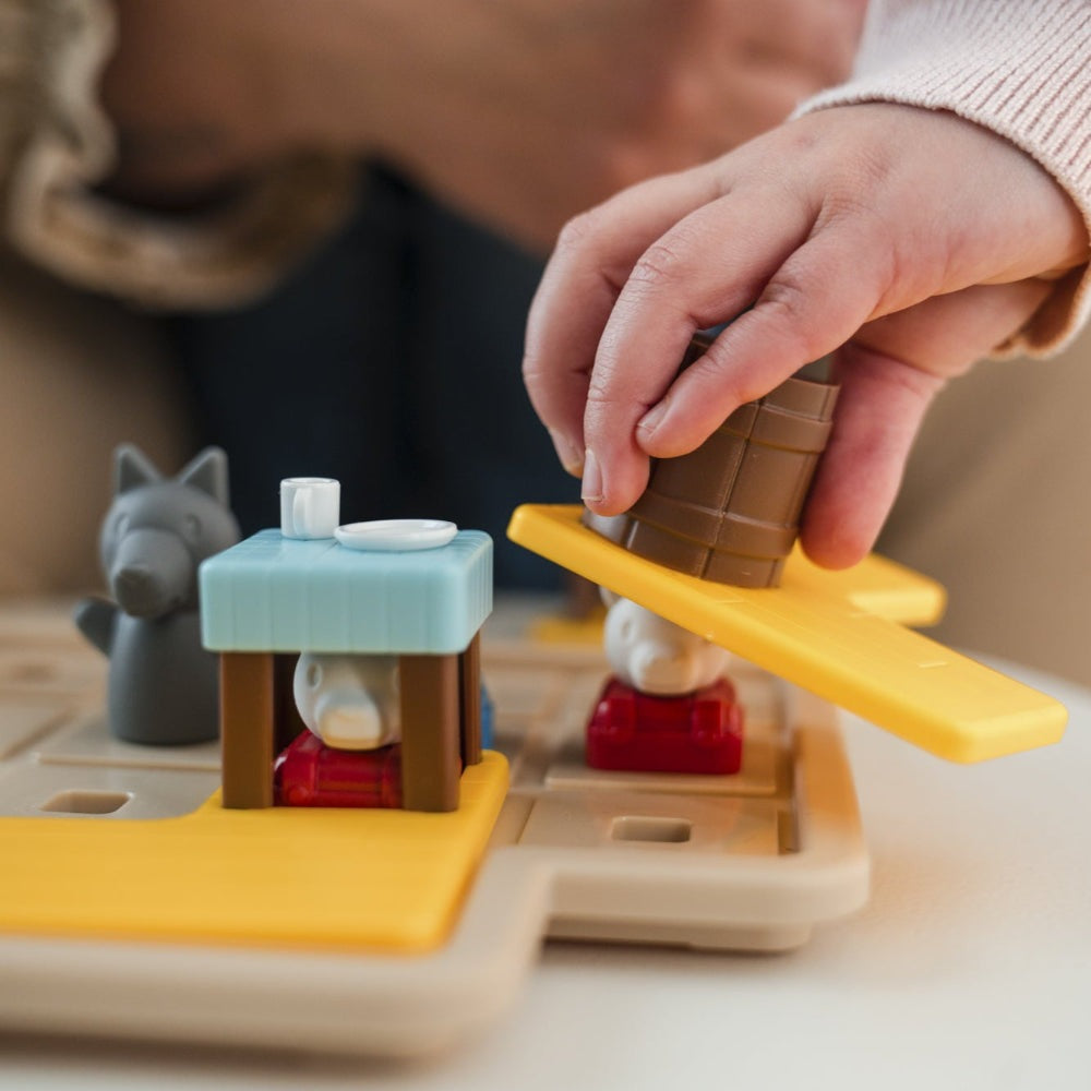 Smart Games The Wolf & The Seven Goats puzzle toy with yellow platforms and grey wolf figure