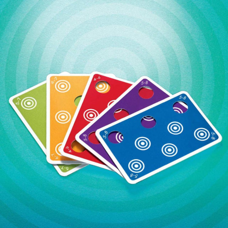 Smart Games Top Spot card set: six colorful cards from SMART GAMES with circular target holes.