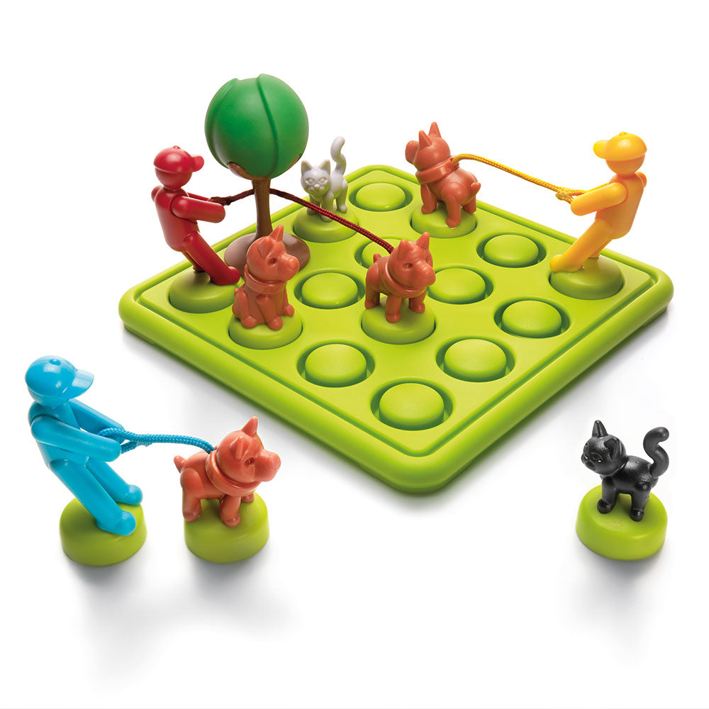 Smart Games Walk the Dog board game with colorful figures and multiple dogs on a bright green grid