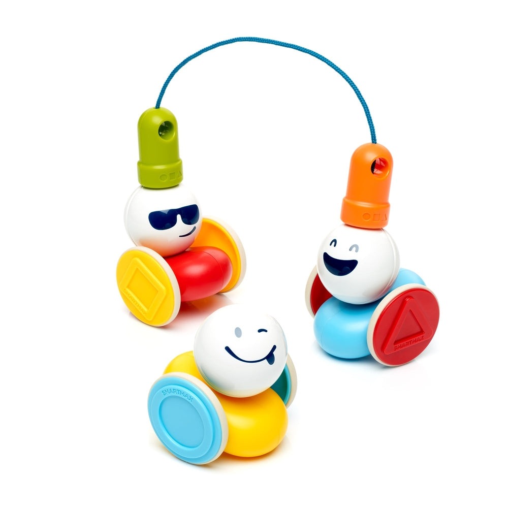 SmartMax My First Wobbly Cars toy set of 3 smiling magnet cars with yellow, red, and blue wheels.