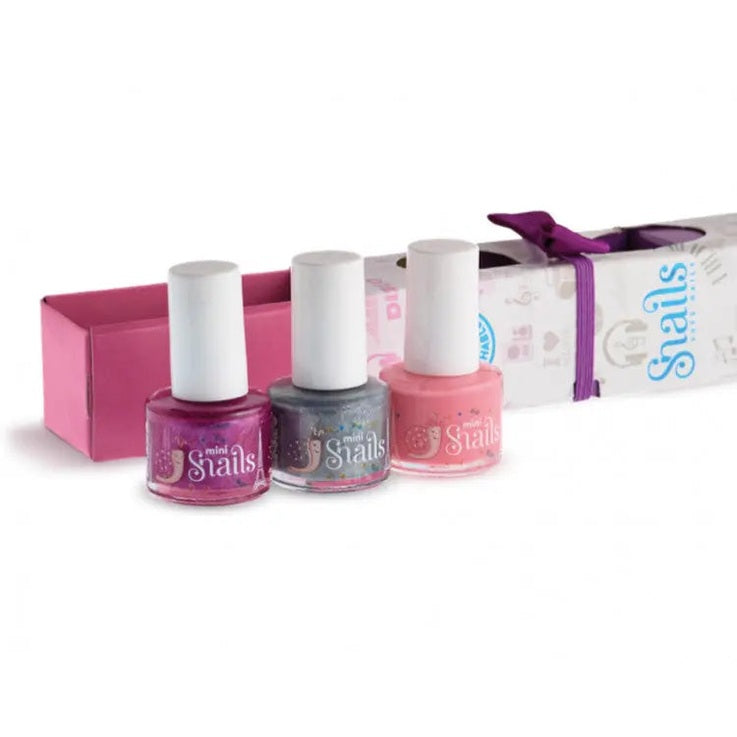 Snail Mini 3 Pack nail polishes—pink, glitter gray, peach—standing upright beside pink box, STORTZ TOYS.