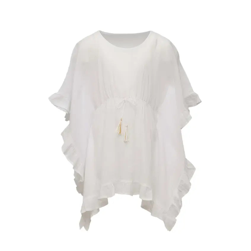 Snapper Rock White Frilled Cover Up worn loose with tassel waist tie and flowing hem