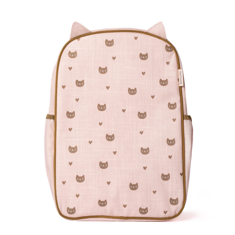SoYoung Grade School Backpack in pink fabric with brown cat-face pattern and trim, standing upright with side pockets.