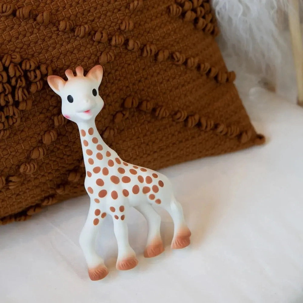 Sophie la Girafe teether, white giraffe with orange spots, baby teething toy by Sophie la Girafe