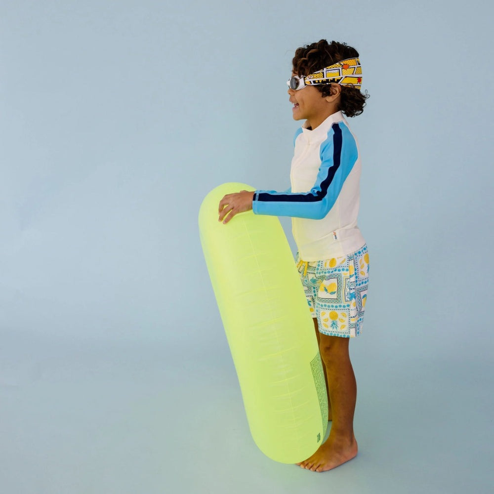 Splash Swim Goggles Comics for kids with neon yellow inflatable board and patterned swim shorts