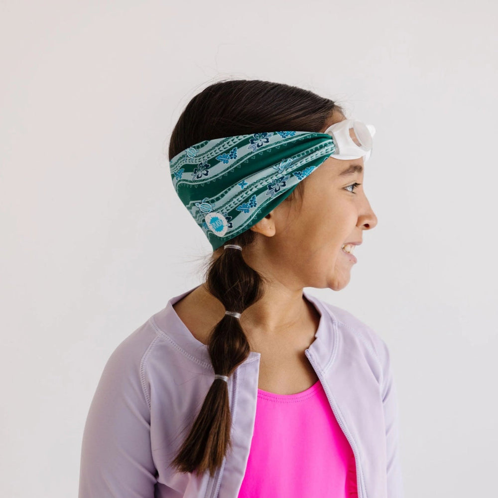 Splash Swim Goggles Turtle Turnpike worn by girl with teal patterned headband