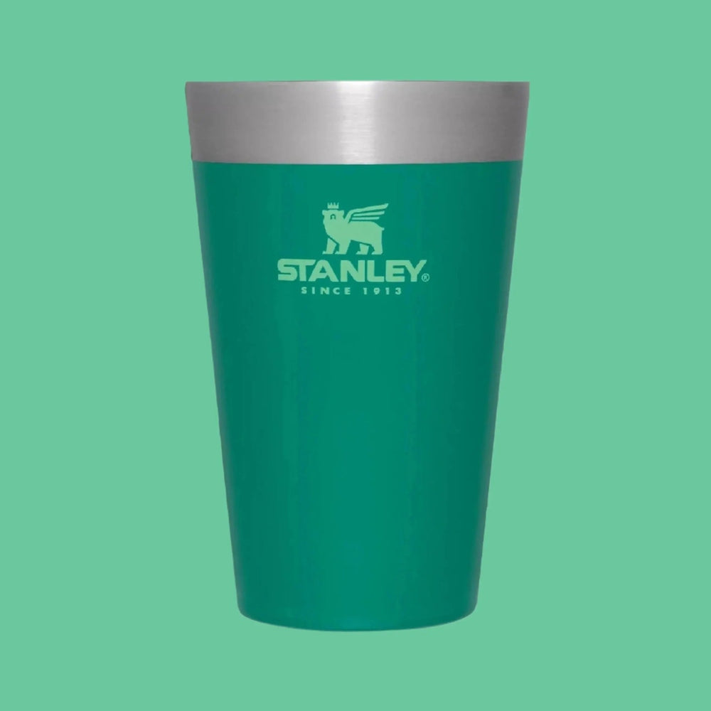 Stanley Adventure Stacking Beer Pint 16 oz teal tumbler with silver rim, shown upright to highlight stacking design.