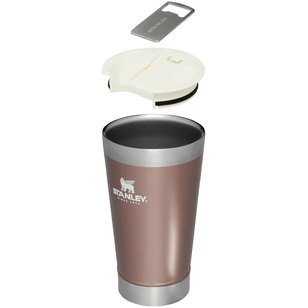 Stanley Classic Stay Chill Beer Pint 16 oz stainless tumbler in copper-brown with silver rim; white lid sits nearby.