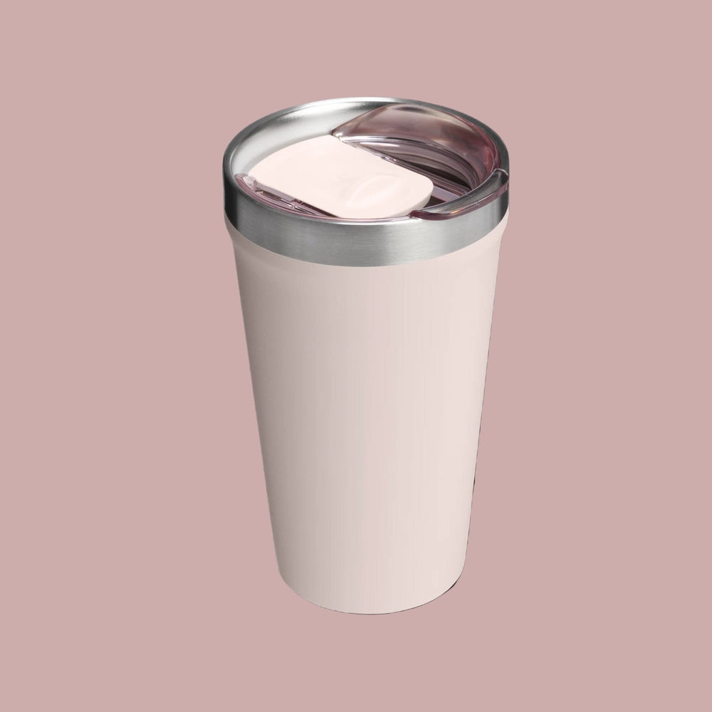 Stanley Everyday Tumbler 16oz in soft pink with stainless steel rim and sliding lid, perfect for on-the-go hydration