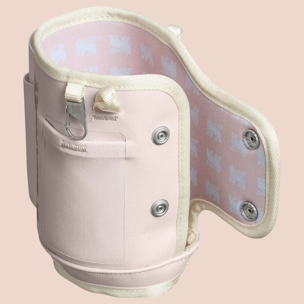 Stanley All Day Quencher Carry-All 30 oz water bottle carrier in pale pink with cream trim and interior pattern