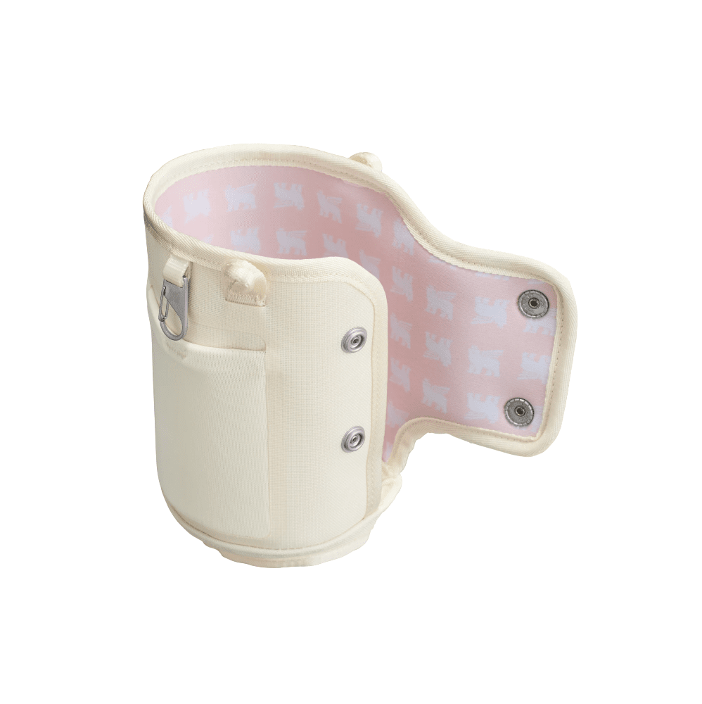 Stanley All Day Quencher Carry-All 40 oz bottle carrier, cream exterior with pink patterned lining