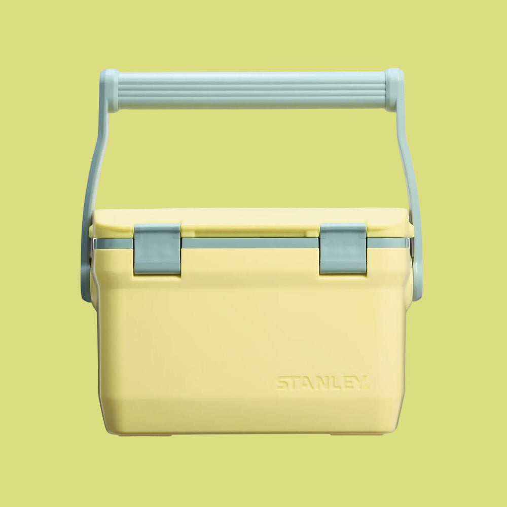 Stanley The Easy Carry Lunch Cooler 7 QT, yellow body with blue latches, carried by a sturdy blue handle.