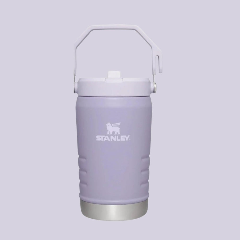 Stanley The IceFlow Flip Straw Jug 40 oz in lavender, upright with white flip-top lid and carry handle.