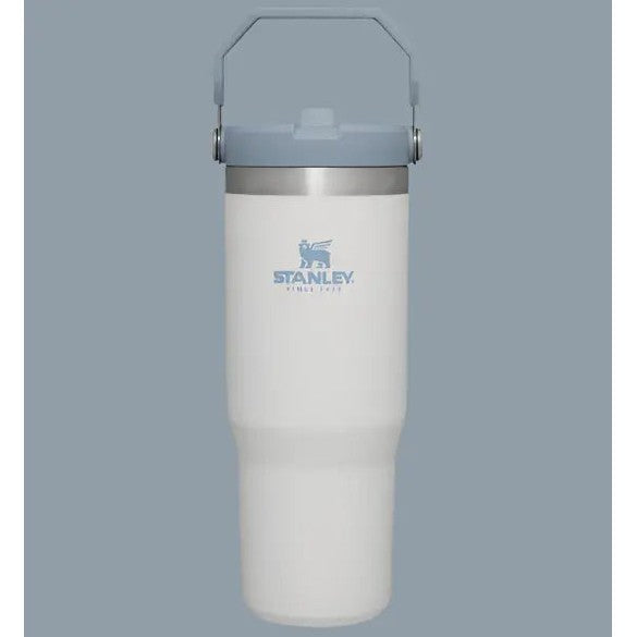 Stanley The Iceflow Flip Straw Tumbler 30 oz in white with blue flip-top lid and raised blue carrying handle