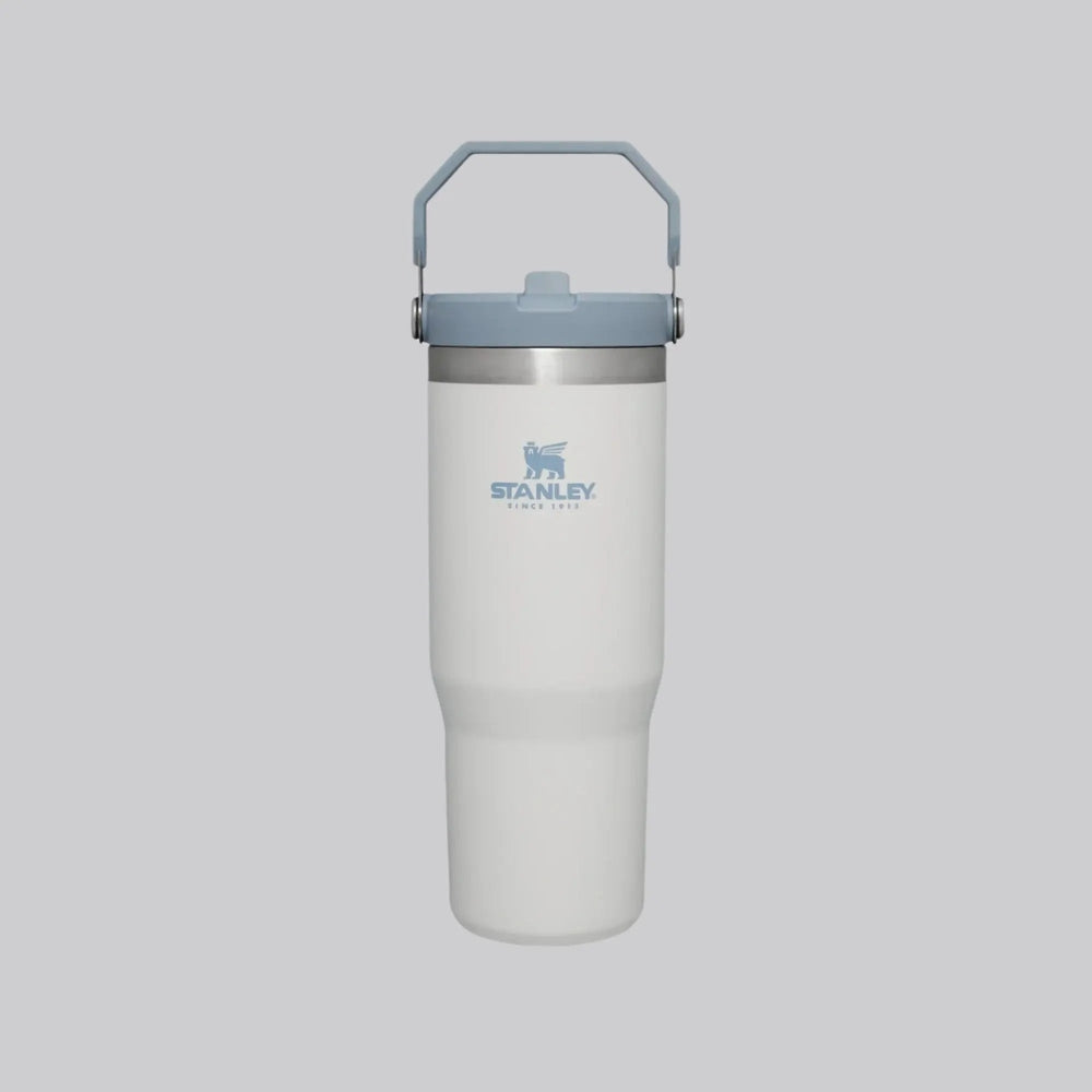 Stanley The Iceflow Flip Straw Tumbler 30 oz in white with blue lid; upright with foldable handle and ready-to-use straw