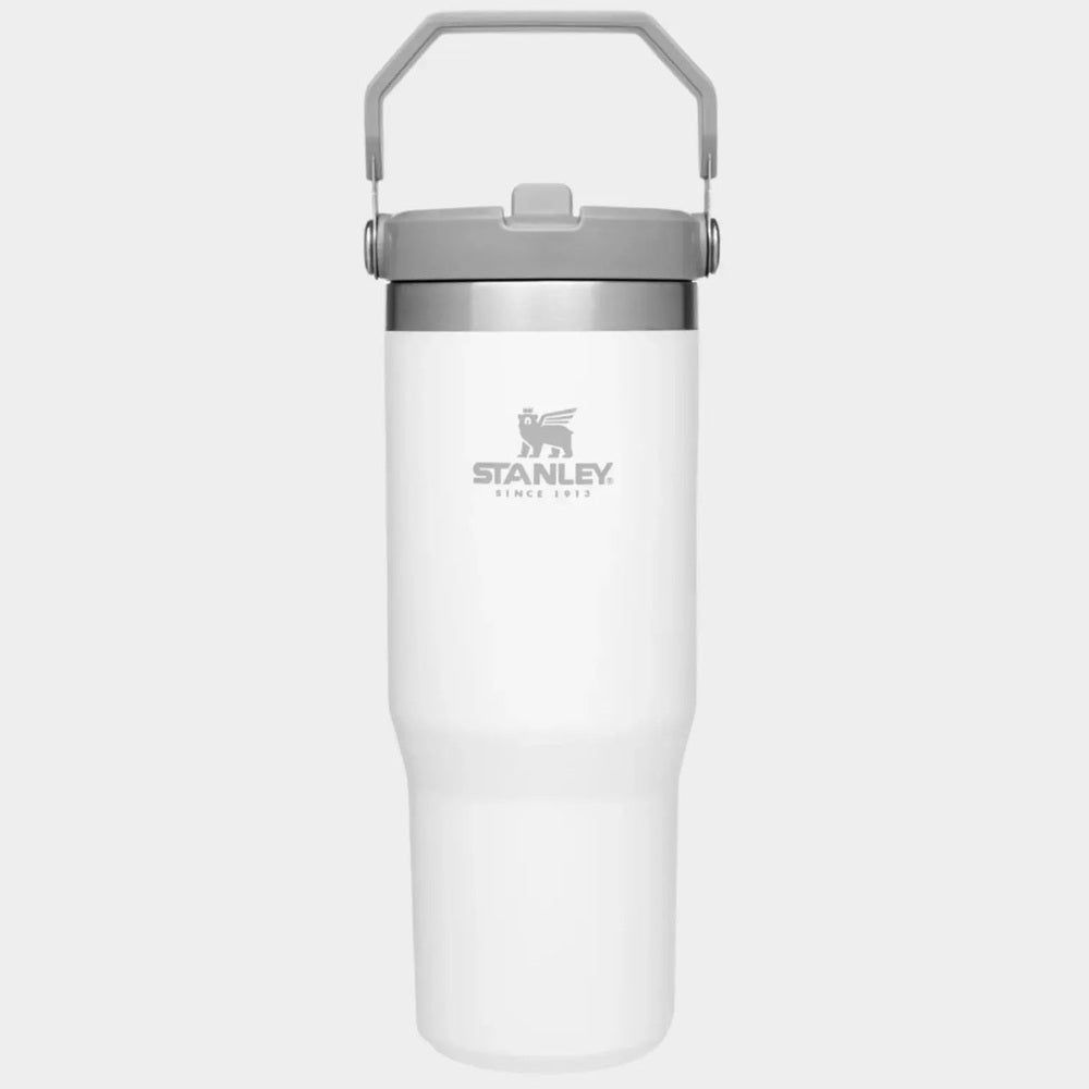 Stanley The Iceflow Flip Straw Tumbler 30 oz white with gray lid, carried by its attached gray handle.