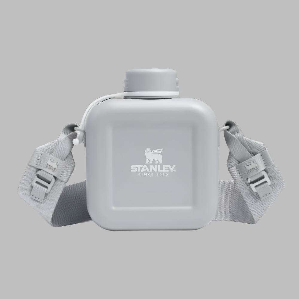 Stanley Next X Nature Canteen 25 oz water bottle with gray finish and adjustable strap.