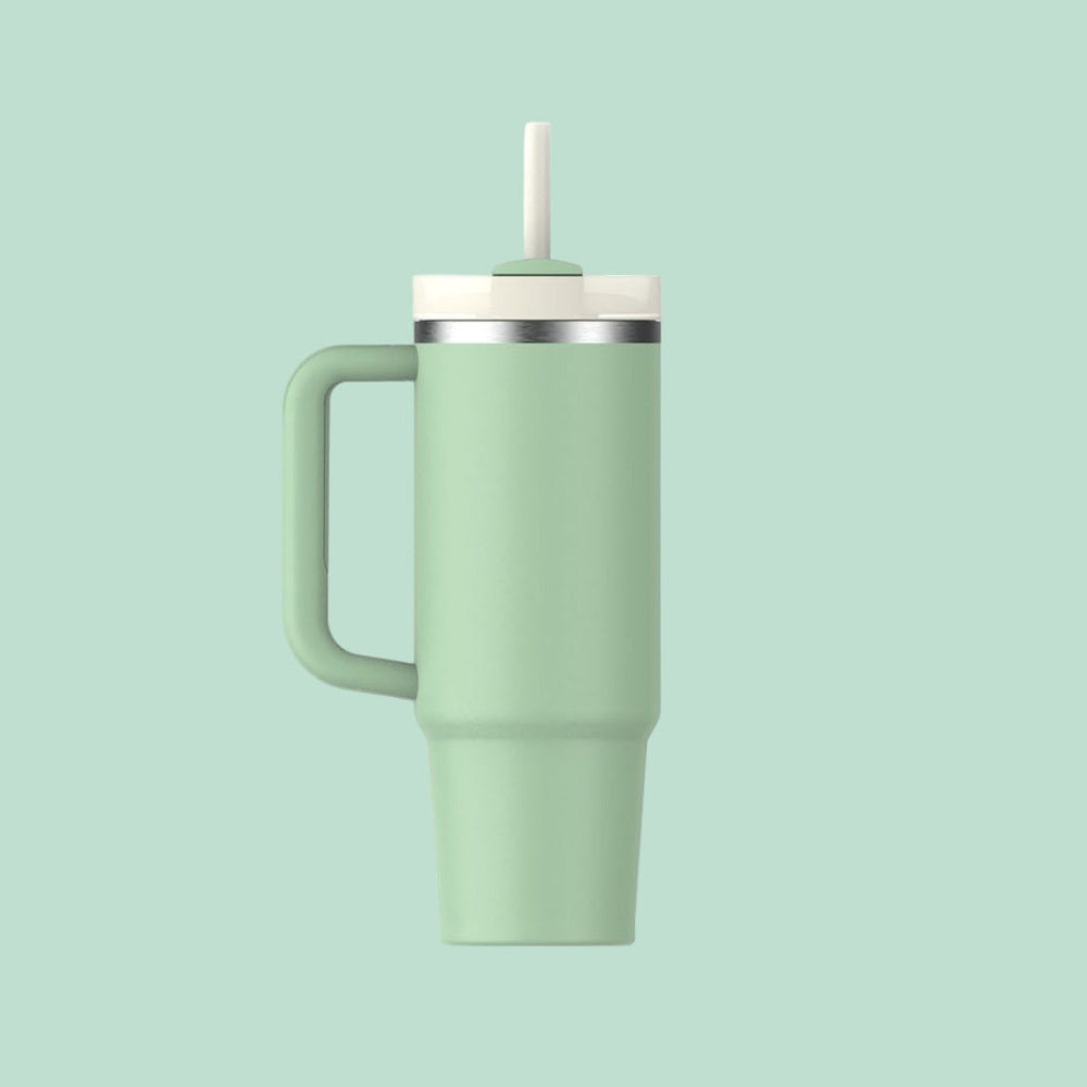 Stanley The Quencher H2.0 Flowstate Tumbler 30 oz mint green with straw lid, ready to sip