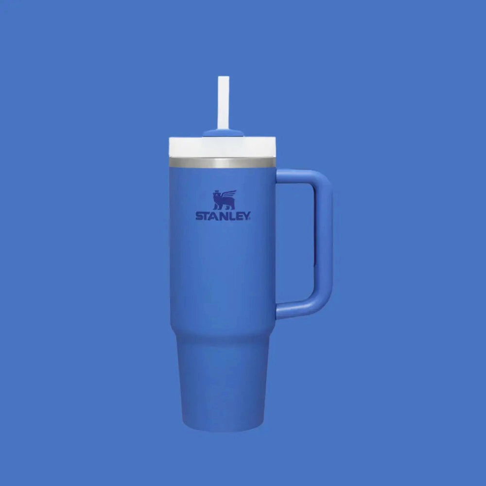 Stanley The Quencher H2.0 Flowstate 30 oz blue tumbler with white lid and straw, ready for everyday use.