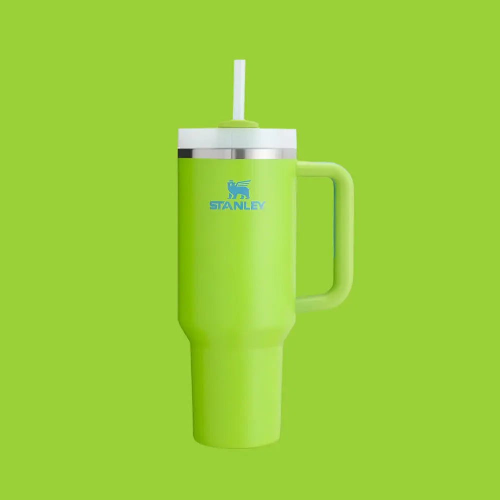 Stanley Quencher H2.0 Flowstate 30 oz tumbler in lime green with white lid, straw, and handle.