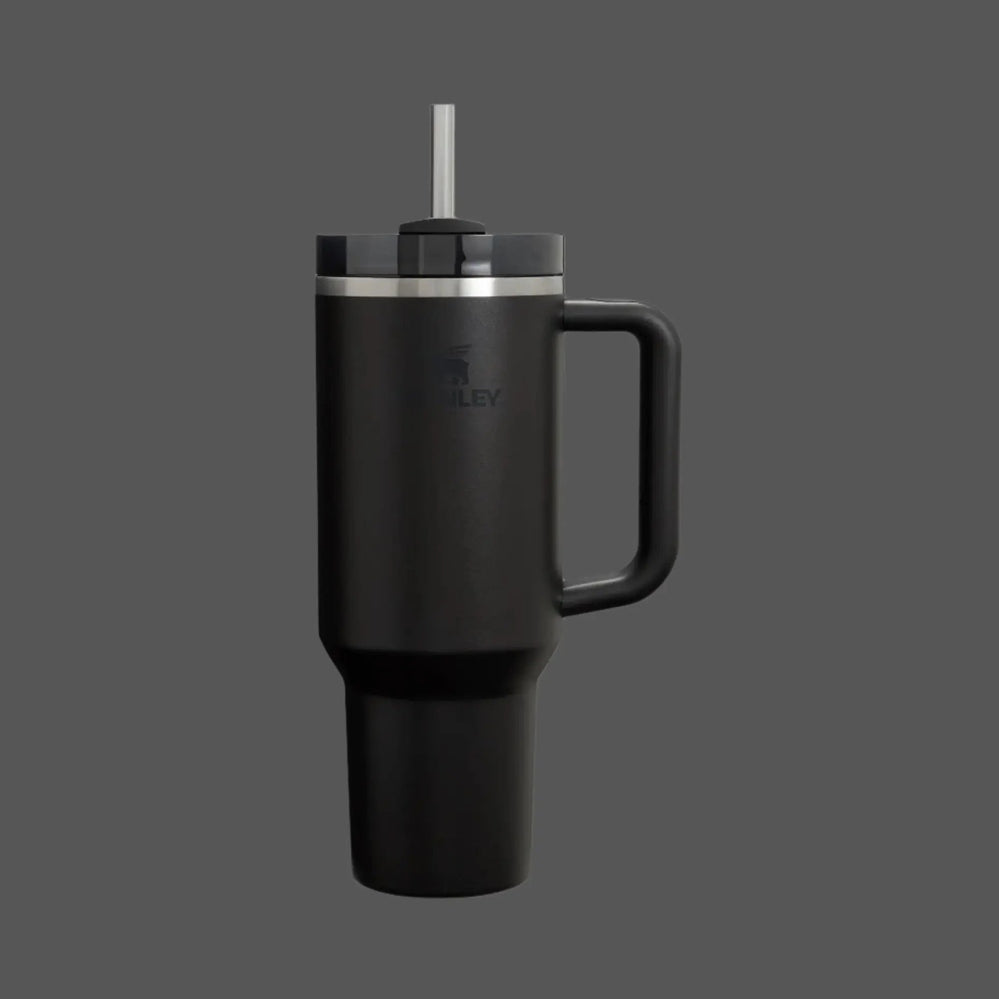 Stanley The Quencher H2.0 Flowstate Tumbler 40 oz black with handle and straw lid, ready for sipping with extended straw