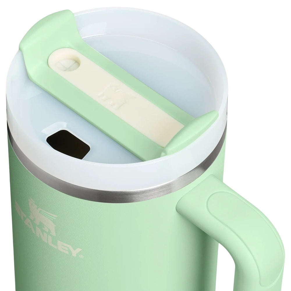 Stanley Quencher H2.0 Flowstate 40 oz tumbler in mint green with integrated handle and slide-open lid