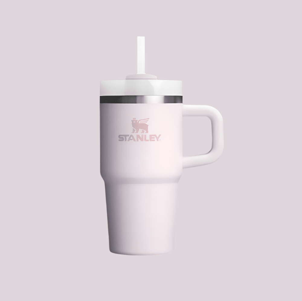 Stanley Quencher H2.0 Flowstate tumbler with handle, 20 oz, pink gradient with STANLEY logo