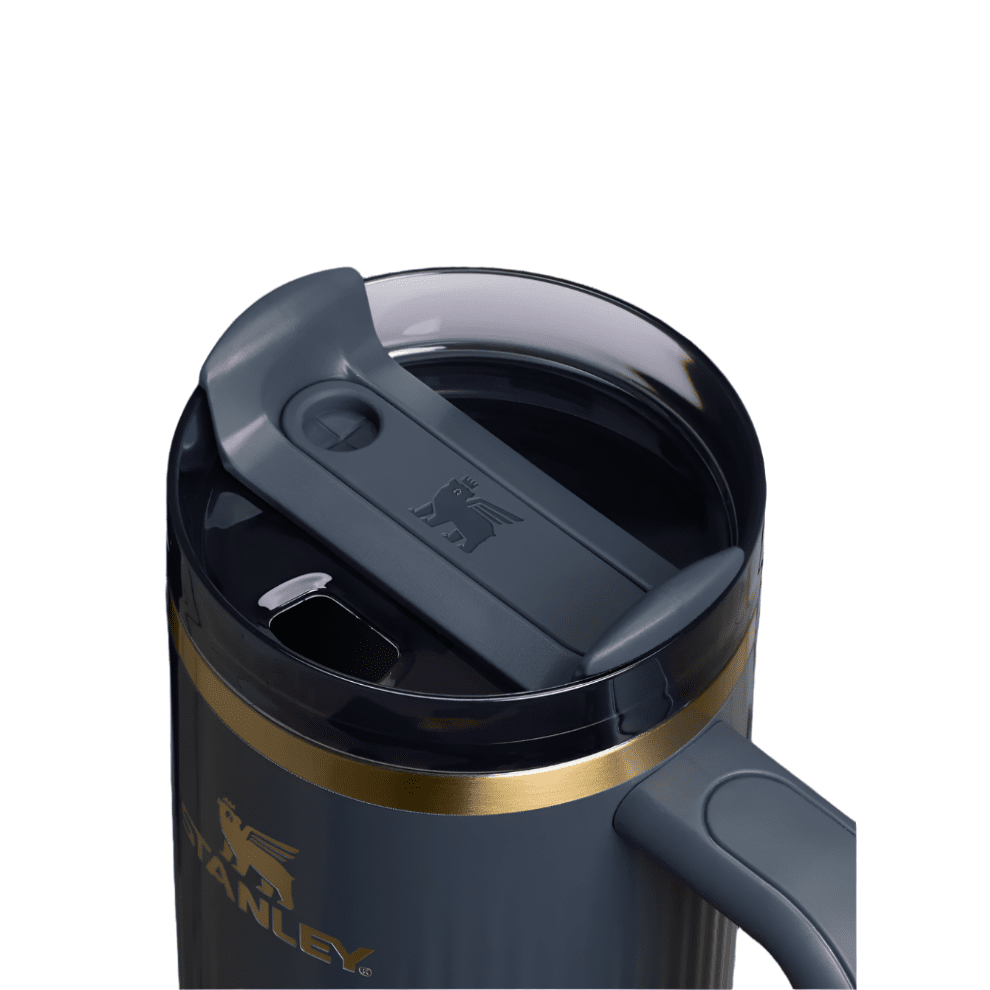 Stanley Quencher H2.0 30 oz fluted tumbler in navy with gray lid and gold band