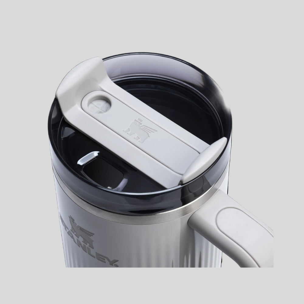 STANLEY The Quencher H2.0 Fluted Tumbler 30 oz with white lid, showing secure flip-top opening.