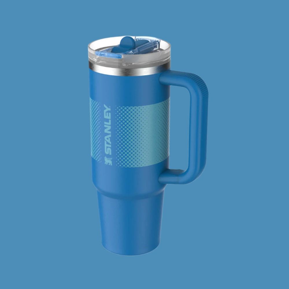 Stanley Quencher ProTour Flip Straw Tumbler 30 oz in blue with handle and lid flipped open for sipping.
