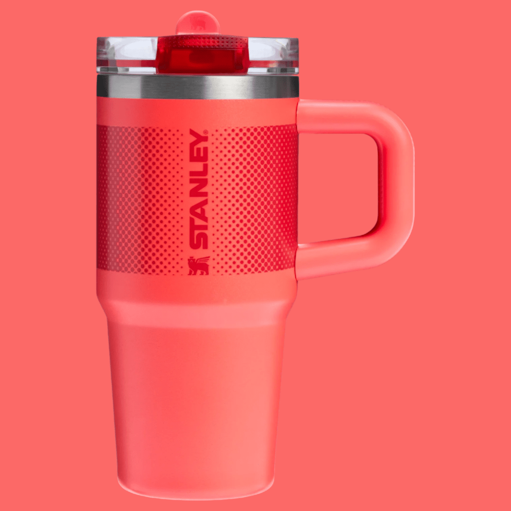 Stanley The Quencher Protour Flip Straw Tumbler 14 oz in coral red with textured grip and handle.