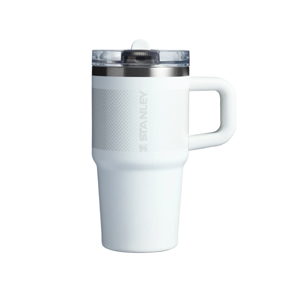 Stanley Quencher Protour Flip Straw Tumbler 20 oz; white with textured grip, clear lid, and handle, standing upright.