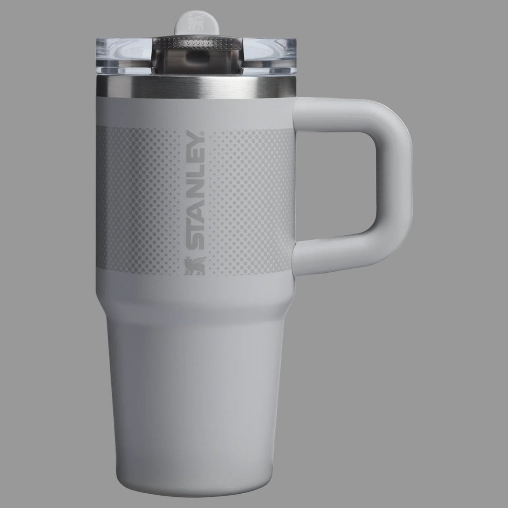 Stanley The Quencher Protour Flip Straw Tumbler 14 oz in light gray with textured grip, flip straw lid, and side handle.