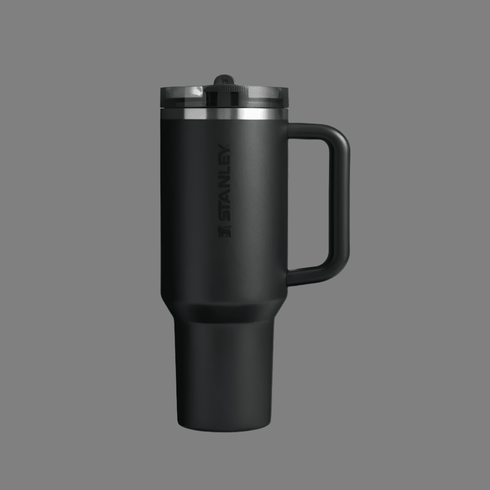 Stanley The Quencher Protour Flip Straw Tumbler 30 oz, black with handle, showing its flip-lid and rugged stainless body.