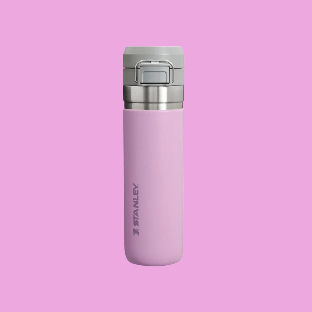 Stanley The Quick Flip GO Bottle 24 oz pink stainless steel with gray flip-lid, lid snapped shut.