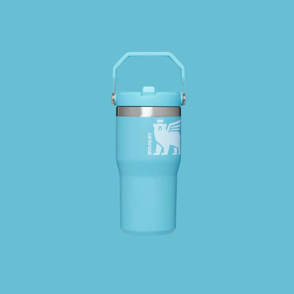 Stanley The Wild Imagination Iceflow Flip Straw Tumbler 20 oz in light blue with built-in carry handle.