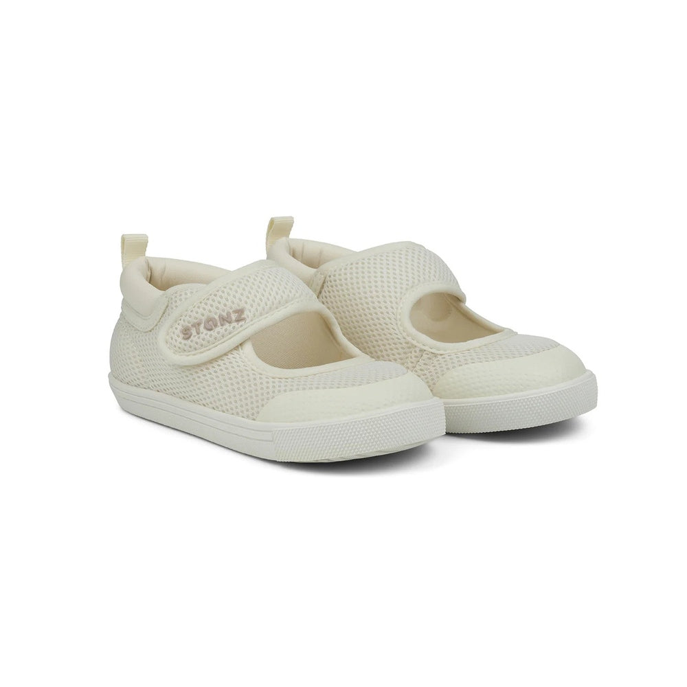 Pair of Stonz Cruiser Mary Jane Toddler Shoes Ivory, breathable mesh with Velcro straps for easy on/off.