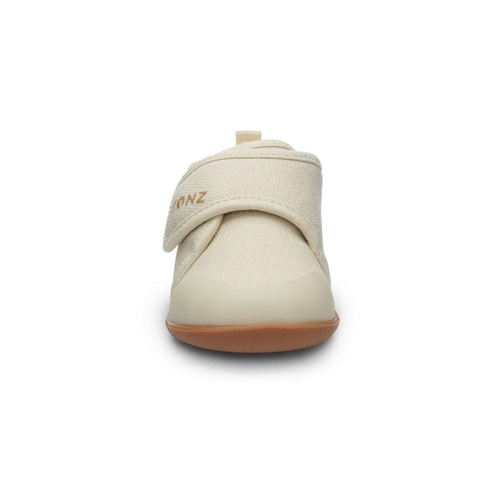 Stonz Cruiser Natural Baby Shoes Oatmeal front view with textured beige fabric and Velcro strap.