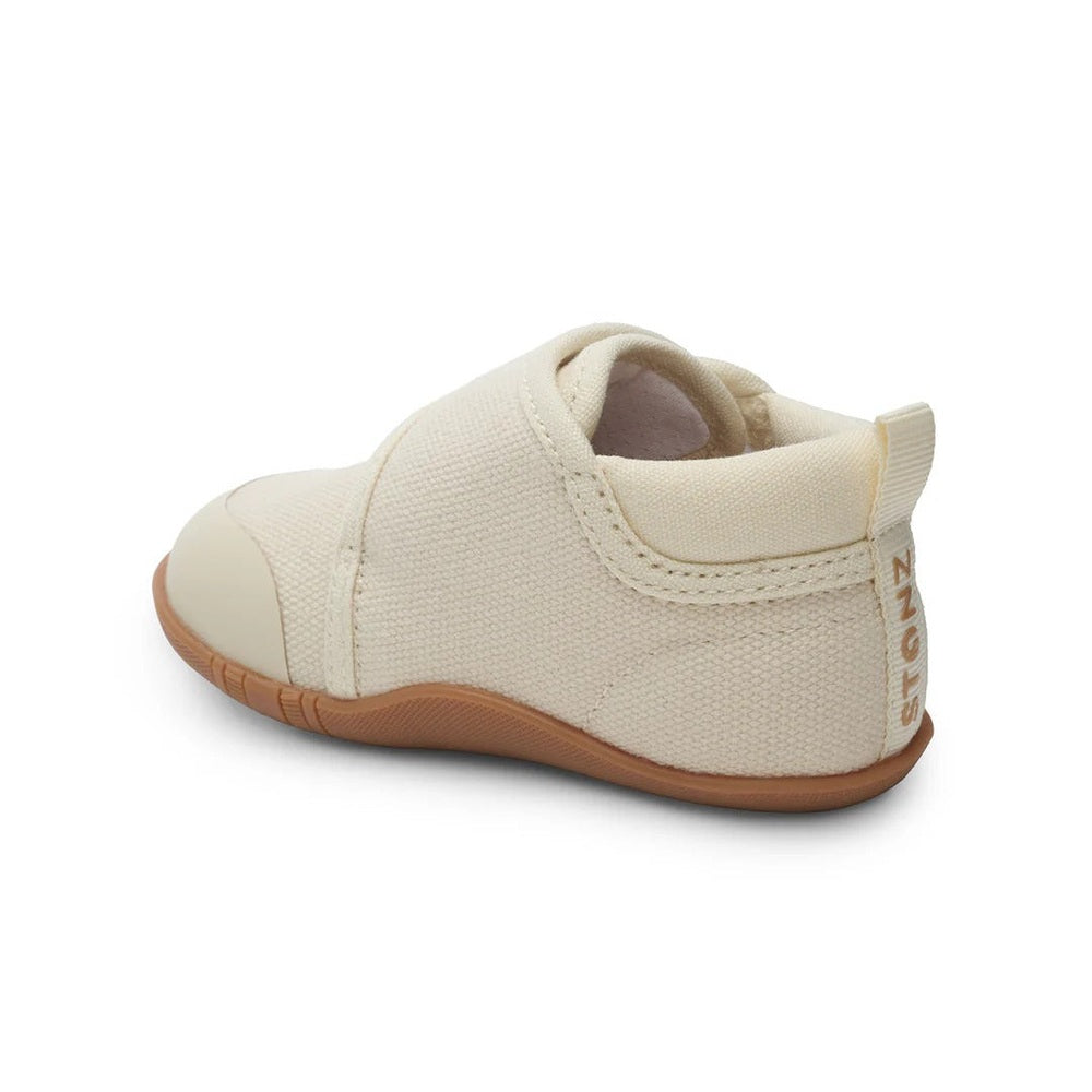 Stonz Cruiser Natural Baby Shoes Oatmeal, soft canvas toddler footwear with rubber sole and back pull tab.