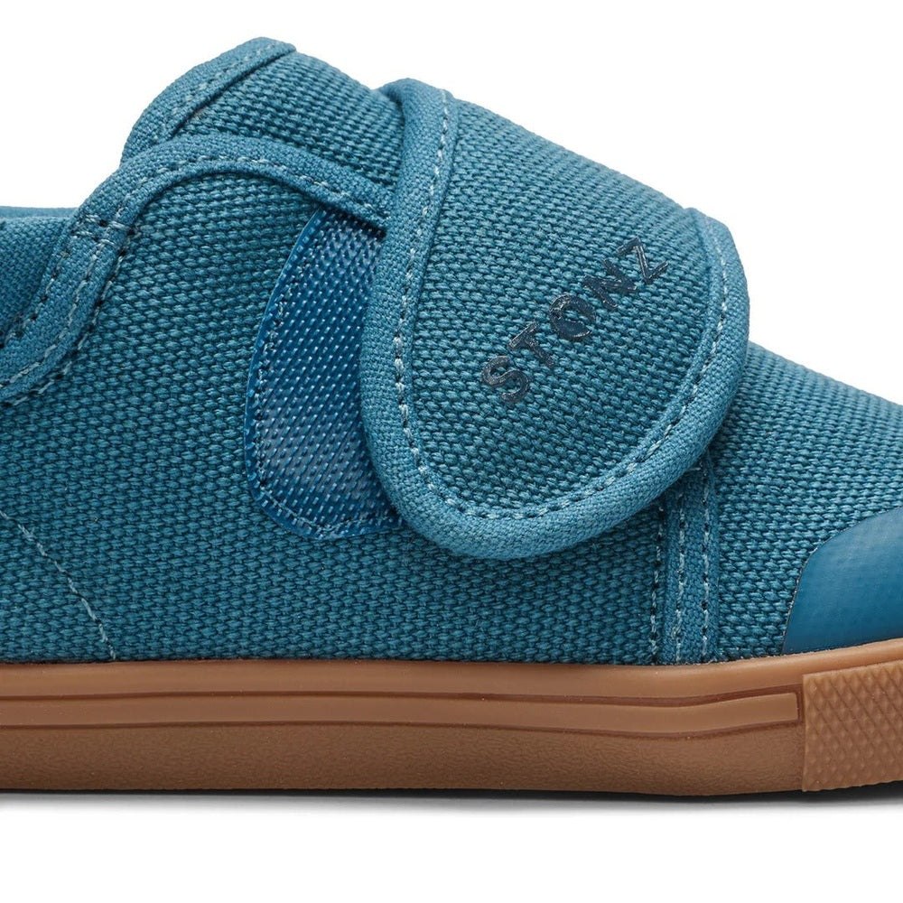 STONZ Cruiser Natural Toddler Shoes Denim with Velcro strap fastened over the top, gum sole visible.
