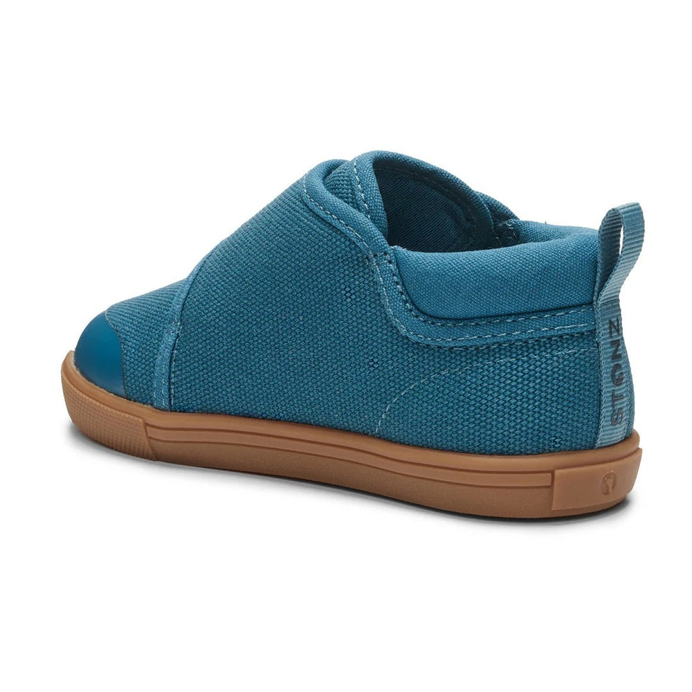 Stonz Cruiser Natural Toddler Shoes Denim blue slip-on with back pull tab and tan sole.