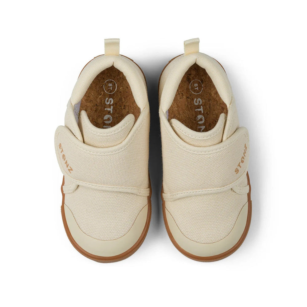 Stonz Cruiser Natural Toddler Shoes in oatmeal beige with Velcro straps; top-down view shows cork insole.