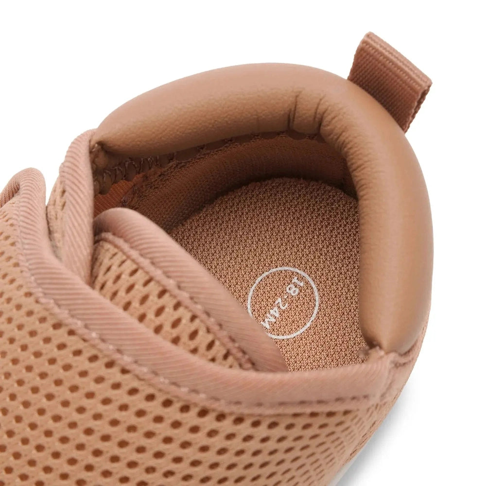 Stonz Cruiser Original Baby Shoes Camel; breathable mesh upper and padded collar shown on a baby foot.