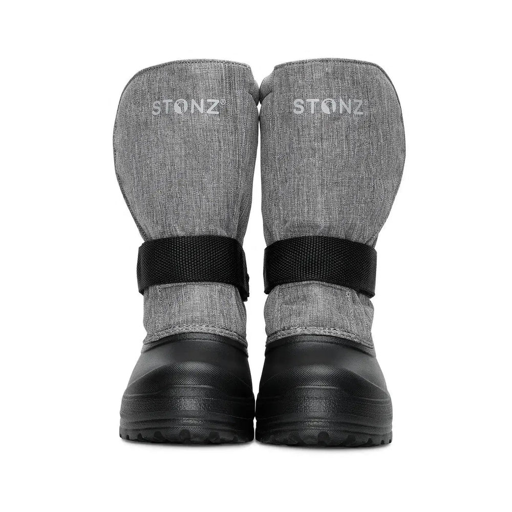 Stonz Trek Kid Snow Boots Heather Grey pair shown front-on with black adjustable strap and rugged outsole.