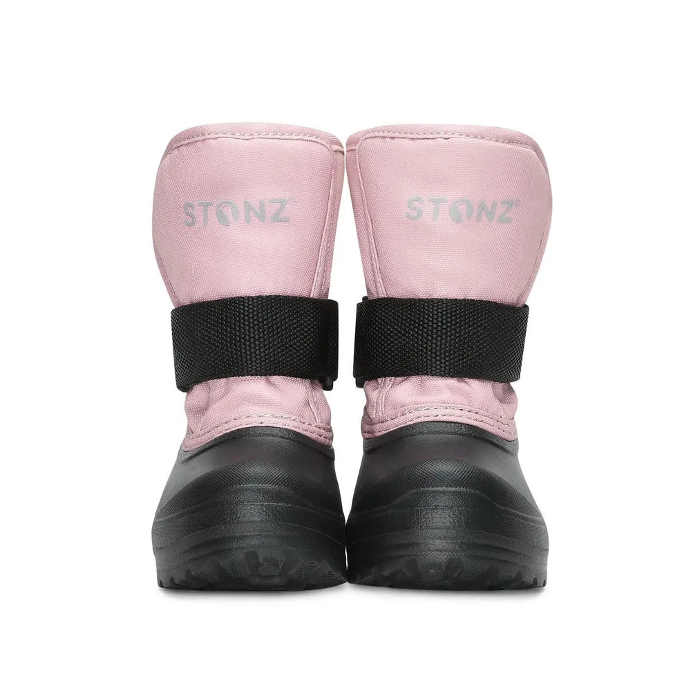 Stonz Trek Toddler Snow Boots Haze Pink; pink uppers with black straps, pair standing upright for winter play.