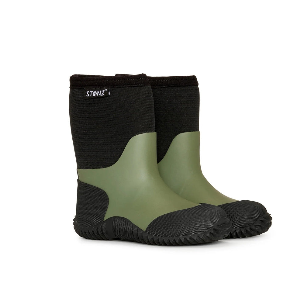 Stonz West Evergreen boots; two green rubber-shells with black knit cuffs, standing side by side with rugged black soles