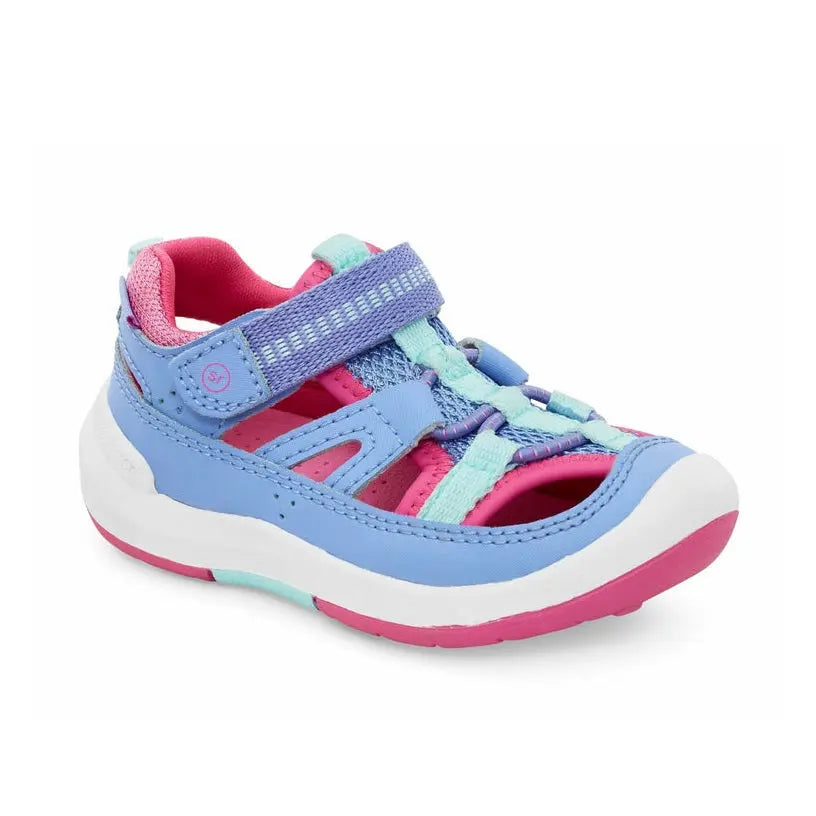Stride Rite Strech Wade Sneaker Sandal Little Kidsper Periwinkle with pink outsole and turquoise accents, Velcro strap fastened for easy on.