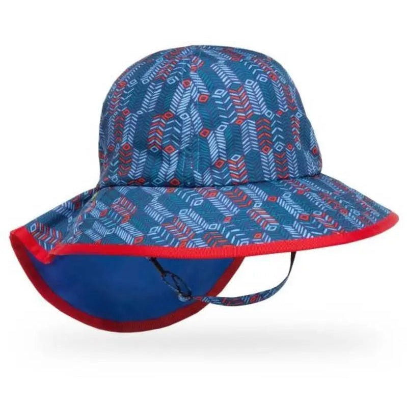 Sunday Afternoons Kids’ Play Hat in blue geometric print with red trim; chin strap fastened.