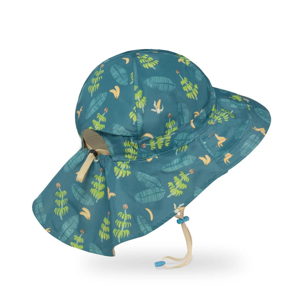 Sunday Afternoons Sundancer reversible hat, teal Banana Split/Birch print with leafy motifs, medium/large