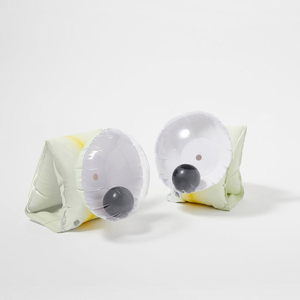 Sunnylife Monty Monster Buddy Float Bands 2-pack inflatable arm bands in white/gray with yellow accents